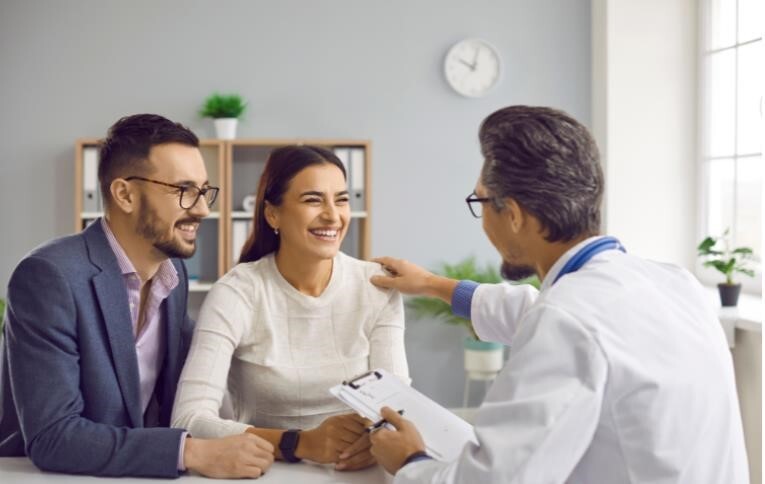 a couple talking to a dr